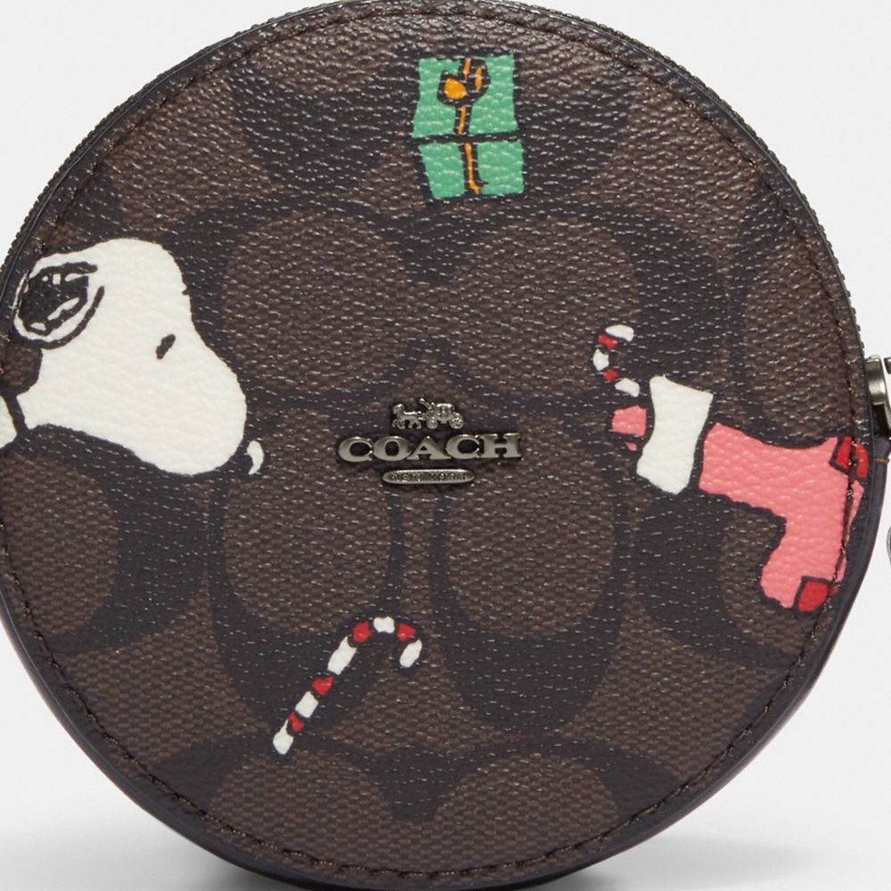 COACH® | Coach X Peanuts Round Coin Case In Signature Canvas With