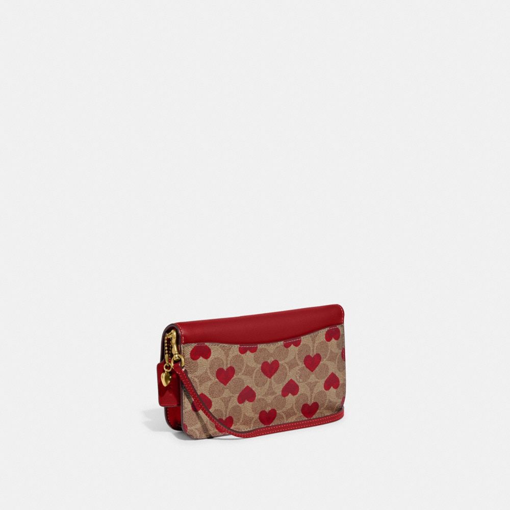 COACH®,HAYDEN CROSSBODY IN SIGNATURE CANVAS WITH HEART PRINT,Signature Coated Canvas,Heart,Brass/Tan Red Apple,Angle View