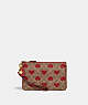 Small Wristlet In Signature Canvas With Heart Print