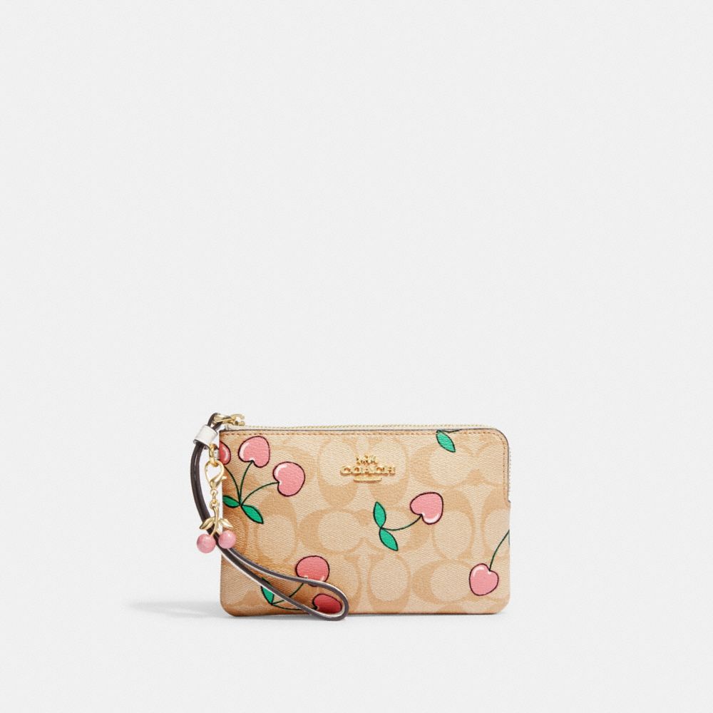 COACH® Corner Zip Wristlet In Signature Canvas With Heart Cherry Print