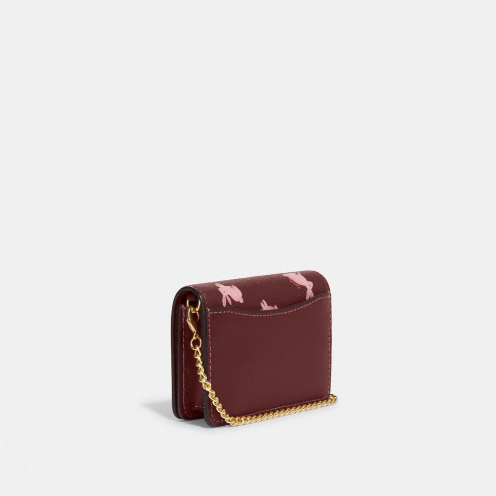 COACH®,LUNAR NEW YEAR MINI WALLET ON A CHAIN WITH RABBIT PRINT,Gold/Wine Multi,Angle View