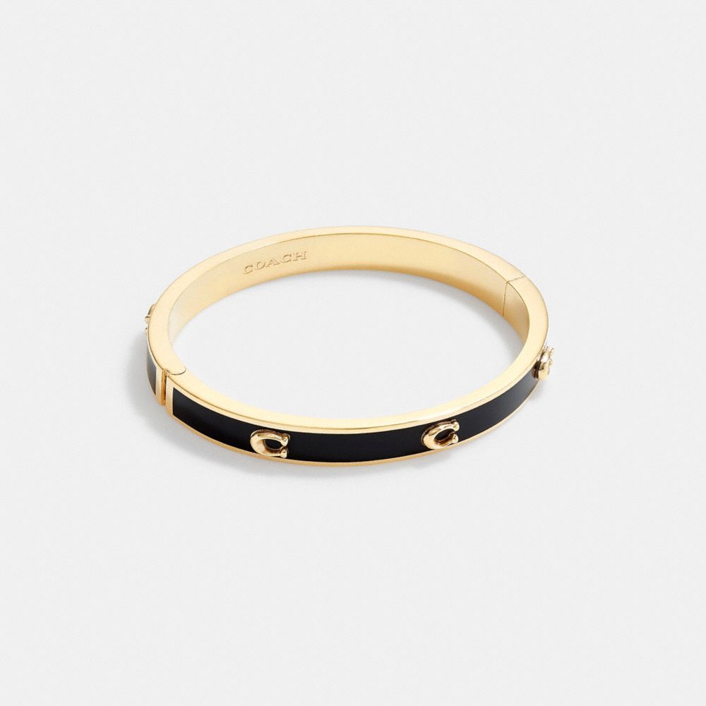 COACH®: Pegged Signature Hinged Bangle