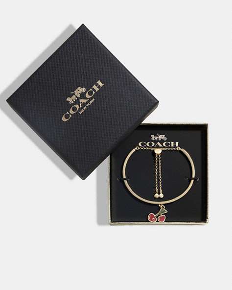 COACH®,HEART CHERRY SLIDER BRACELET,Gold/Red,Front View