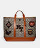 Toby Turnlock Tote In Signature Textile Jacquard With Varsity Patches