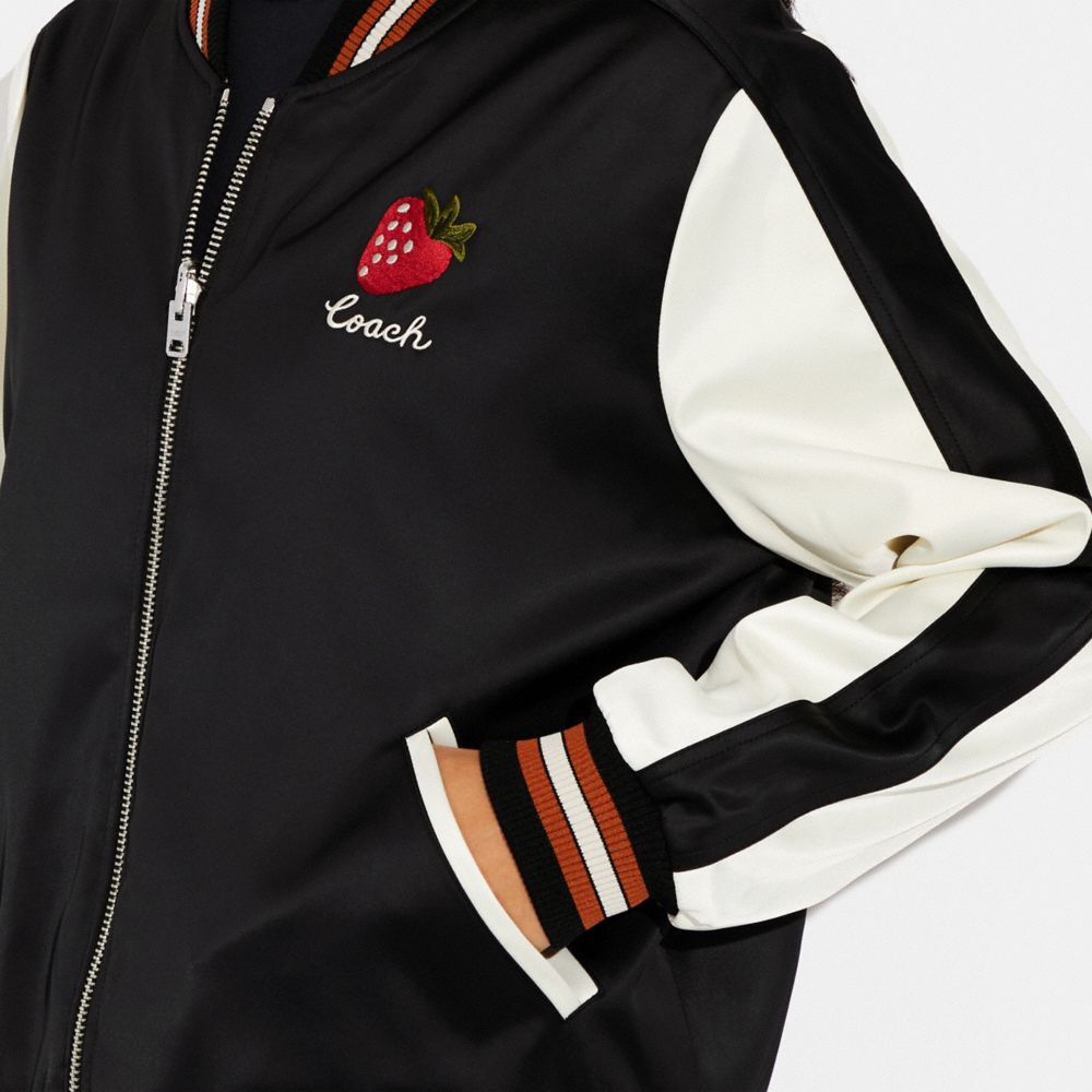 COACH® | Reversible Signature Souvenir Jacket With Strawberry