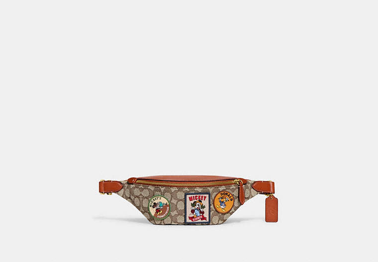 COACH®,DISNEY X COACH CHARTER BELT BAG 7 IN SIGNATURE TEXTILE JACQUARD WITH PATCHES,Signature Jacquard,Small,Cocoa Multi,Front View