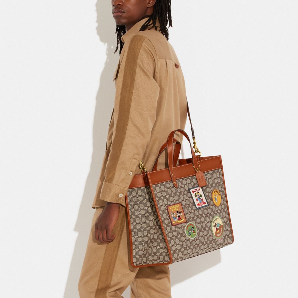 COACH® | Disney X Coach Field Tote 40 In Signature Textile