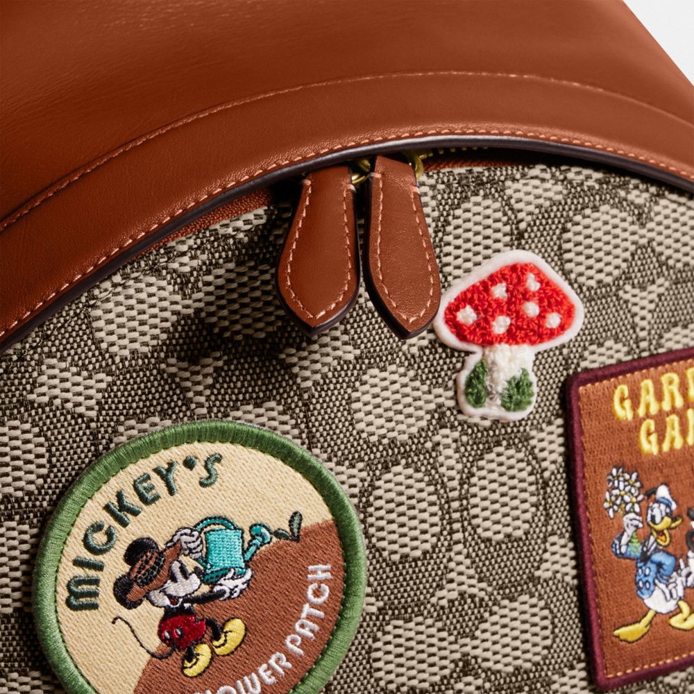 超特価】 【DISNEY X COACH】コート バックパック・シグネチャー