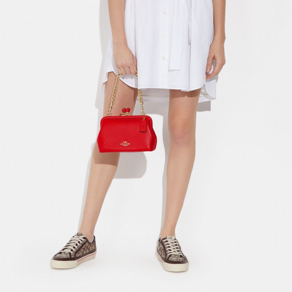 nora kisslock crossbody