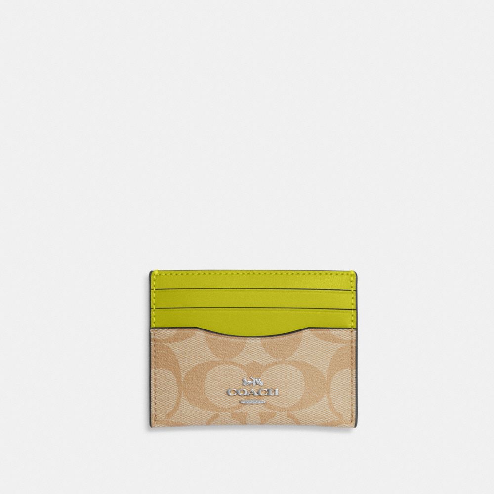 Coach Outlet Slim Id Card Case In Signature Canvas In Silver/light