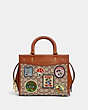 Disney X Coach Rogue 25 In Signature Textile Jacquard With Patches
