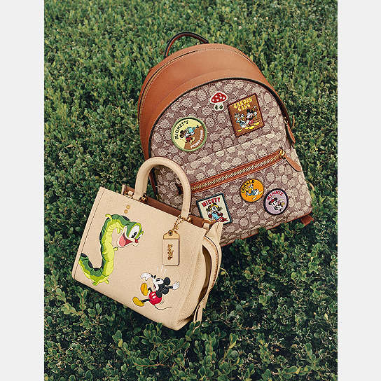 COACH®: Disney X Coach Rogue 25 In Regenerative Leather With 