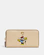 Portefeuille accordéon zippé Disney X Coach en cuir régénératif avec Minnie Mouse