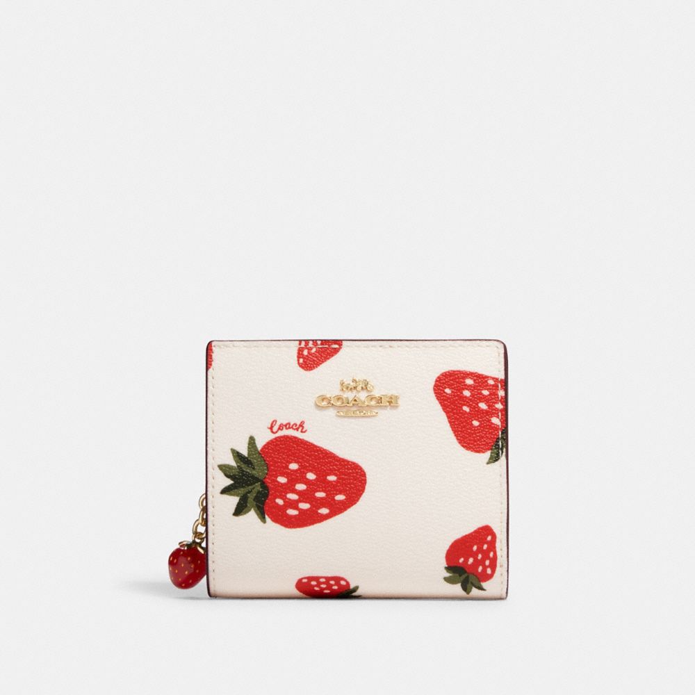 Arriba 71+ imagen strawberry wallet coach