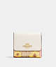 COACH®,SMALL TRIFOLD WALLET IN SIGNATURE CANVAS WITH FLORAL CLUSTER PRINT,Gold/Light Khaki Multi,Front View