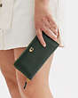 COACH®,ACCORDION ZIP WALLET,Refined Calf Leather,Mini,Brass/Amazon Green,Detail View