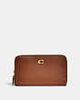 COACH®,MEDIUM ZIP AROUND WALLET,Refined Calf Leather,Brass/1941 Saddle,Front View