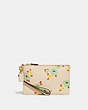COACH®,SMALL WRISTLET WITH FLORAL PRINT,Smooth Leather,Mini,Floral,Brass/Ivory Multi,Front View