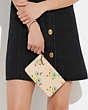 COACH®,SMALL WRISTLET WITH FLORAL PRINT,Smooth Leather,Mini,Floral,Brass/Ivory Multi,Detail View