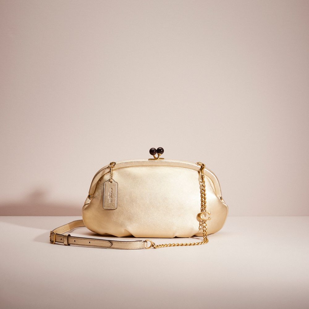 Coach Restored Soft Kisslock Clutch In Brass/metallic Soft Gold