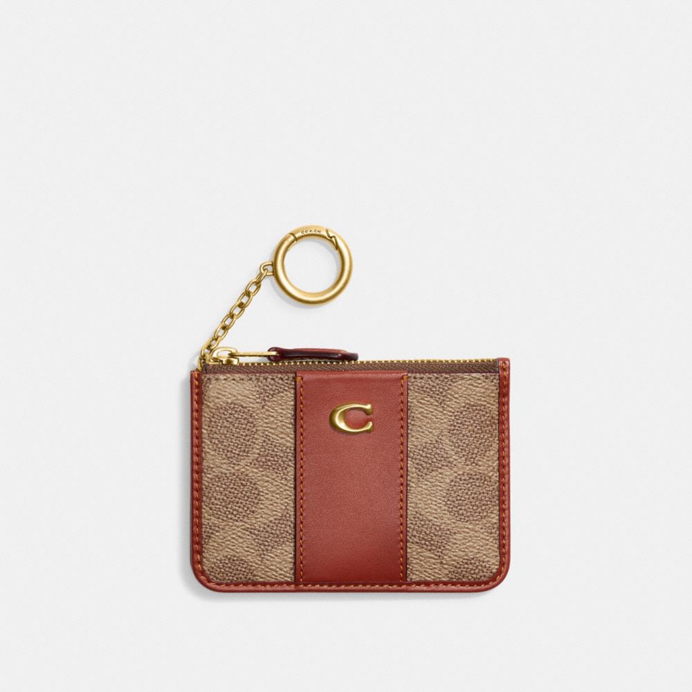 Coach Mini Skinny Id Case In Signature Canvas In Beige