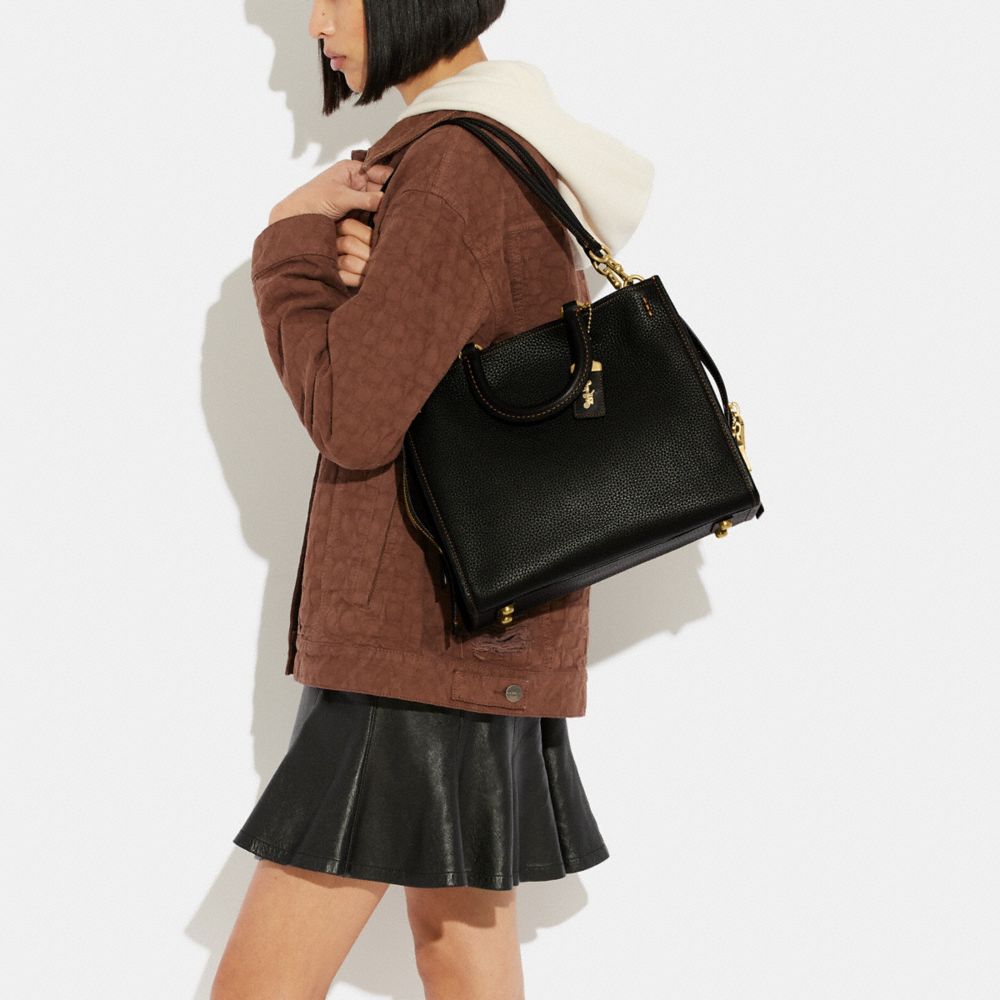 Coach Rogue In Regenerative Leather In Brass/black