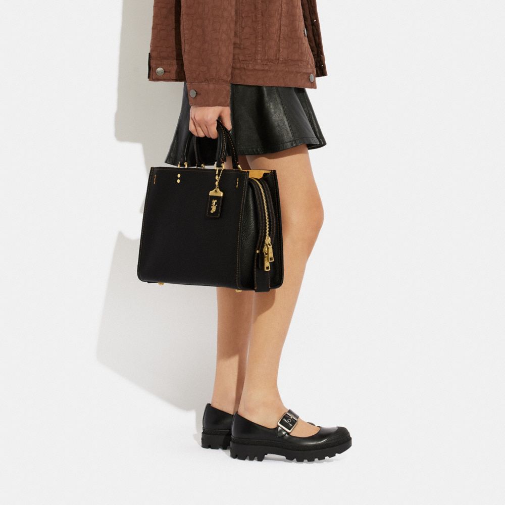 Coach Rogue In Regenerative Leather In Brass/black