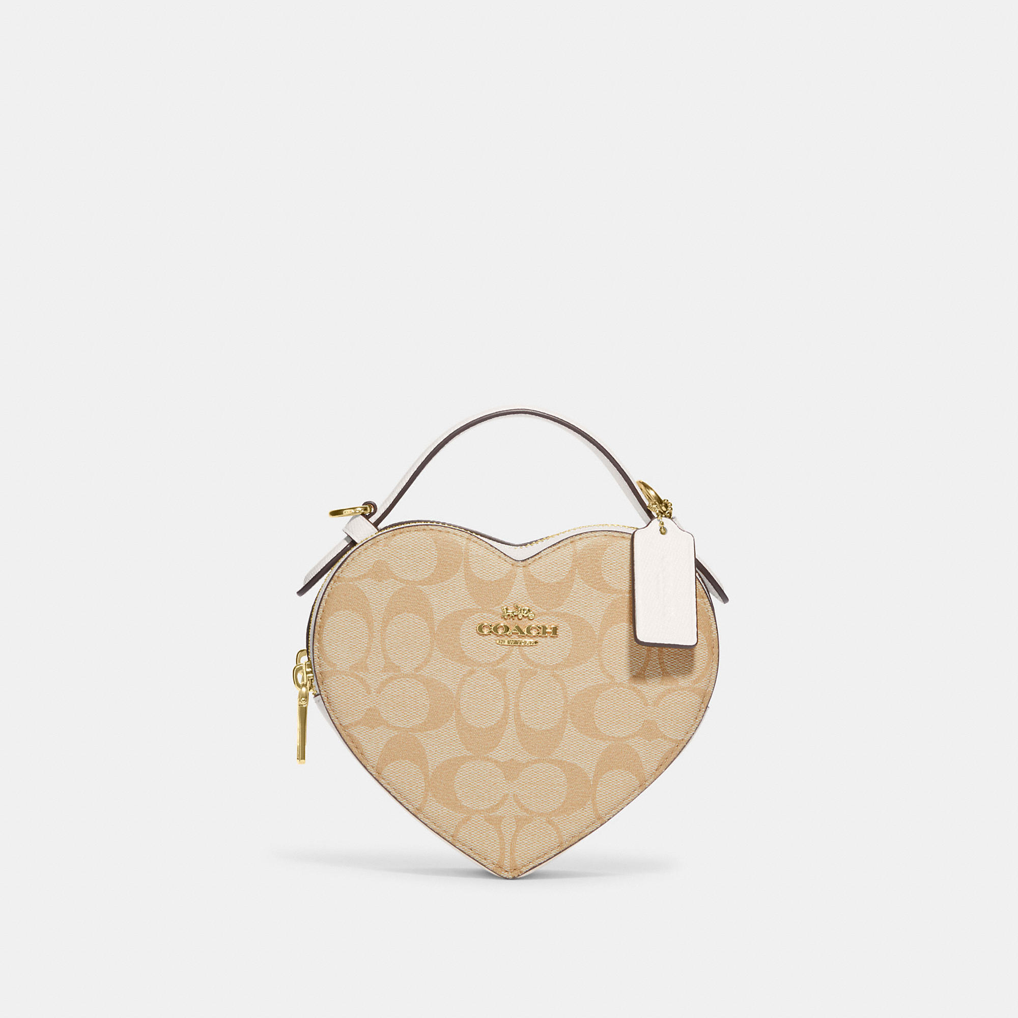 Shop Coach Outlet Heart Crossbody In Signature Canvas In Beige