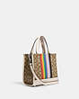 COACH®,DEMPSEY TOTE 22 IN SIGNATURE JACQUARD WITH RAINBOW STRIPE AND COACH PATCH,Jacquard,Silver/Khaki Multi,Angle View