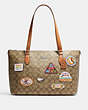 COACH®,GALLERY TOTE IN SIGNATURE CANVAS WITH PATCHES,canvas,Silver/Khaki Multi,Front View