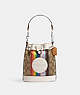 COACH®,MINI DEMPSEY BUCKET BAG IN SIGNATURE JACQUARD WITH RAINBOW STRIPE AND COACH PATCH,Jacquard,Silver/Khaki Multi,Front View