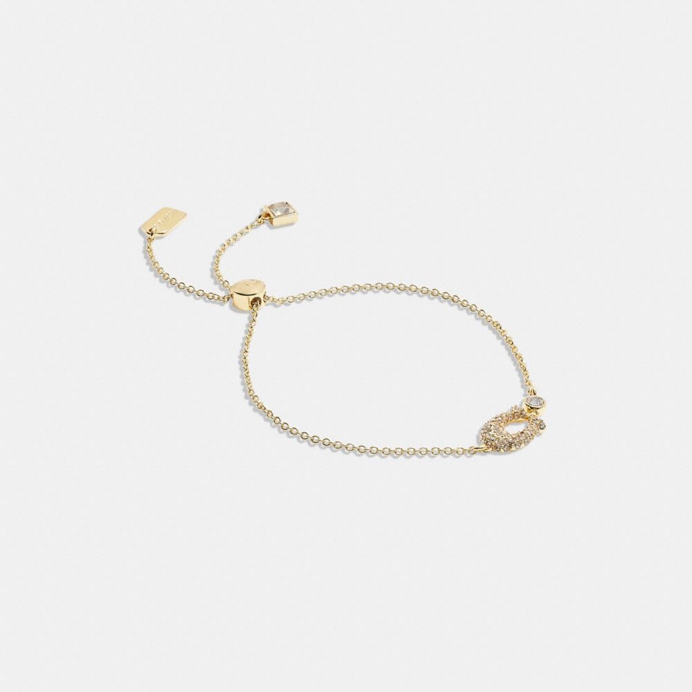 Coach Signature Pavé Slider Bracelet In Gold/clear