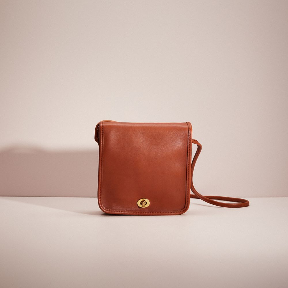 Vintage compact pouch coach 