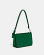 COACH®,POUCH BAG WITH SIGNATURE CANVAS DETAIL,Crossgrain Leather,Green,Angle View