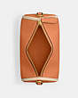 COACH®,ORION BARREL BAG,Polished Pebble Leather,Small,Brass/Faded Orange,Inside View,Top View
