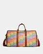 COACH®,GOTHAM DUFFLE IN RAINBOW SIGNATURE CANVAS,Signature Coated Canvas,Large,Burnished Amber Multicolor,Front View