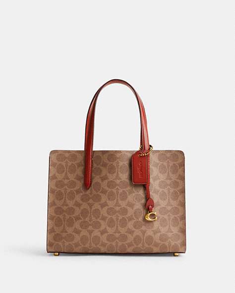 COACH®,CARTER CARRYALL 28 IN SIGNATURE CANVAS,Signature Coated Canvas,Medium,Brass/Tan/Rust,Front View