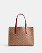COACH®,CARTER CARRYALL 28 IN SIGNATURE CANVAS,Signature Coated Canvas,Medium,Brass/Tan/Rust,Back View
