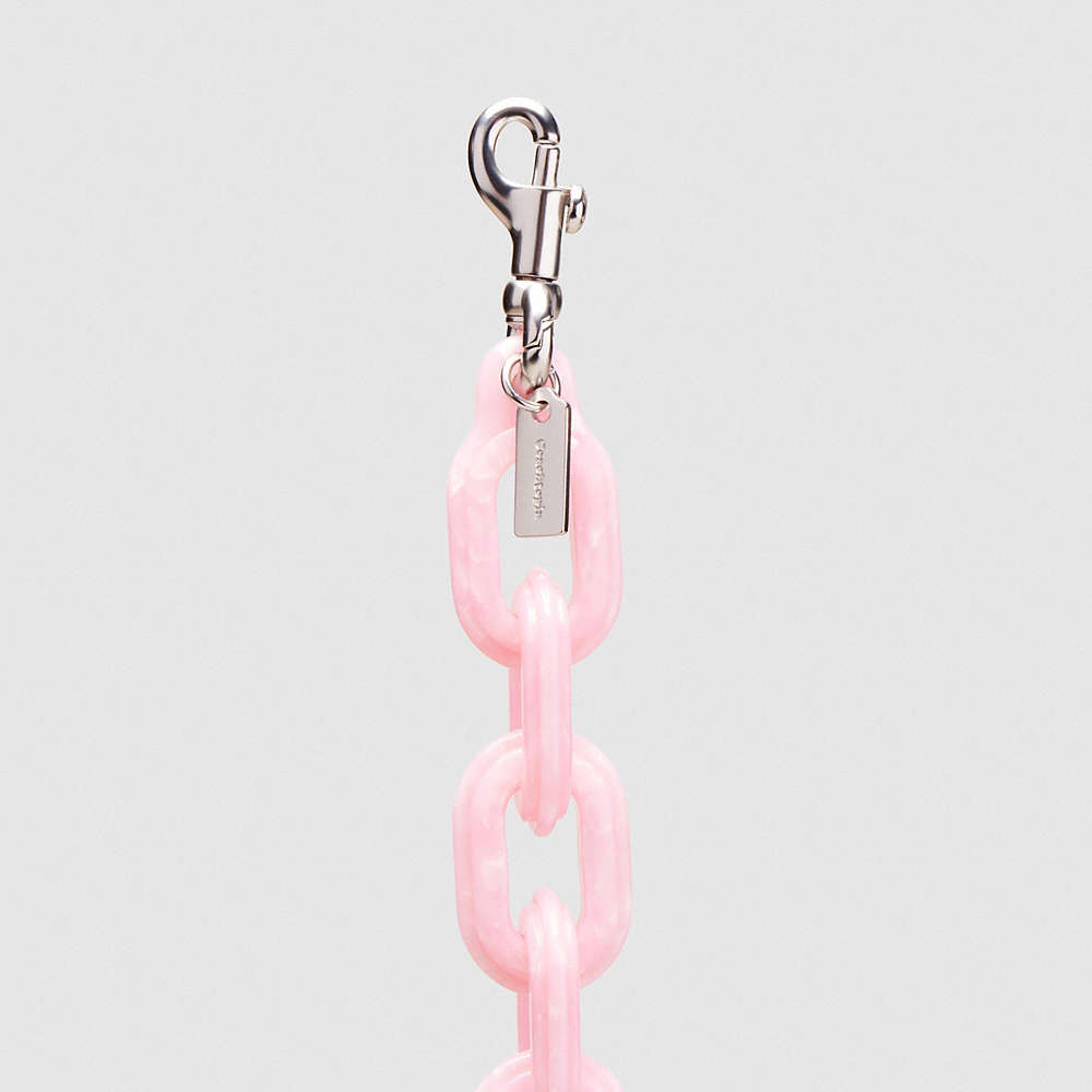Shop Coach Short Chain Strap In Pink