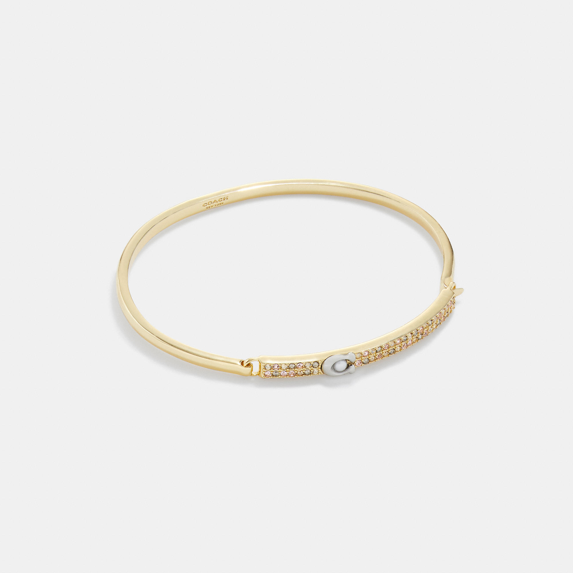 Shop Coach Outlet Signature Pavé Bar Thin Bangle In Yellow