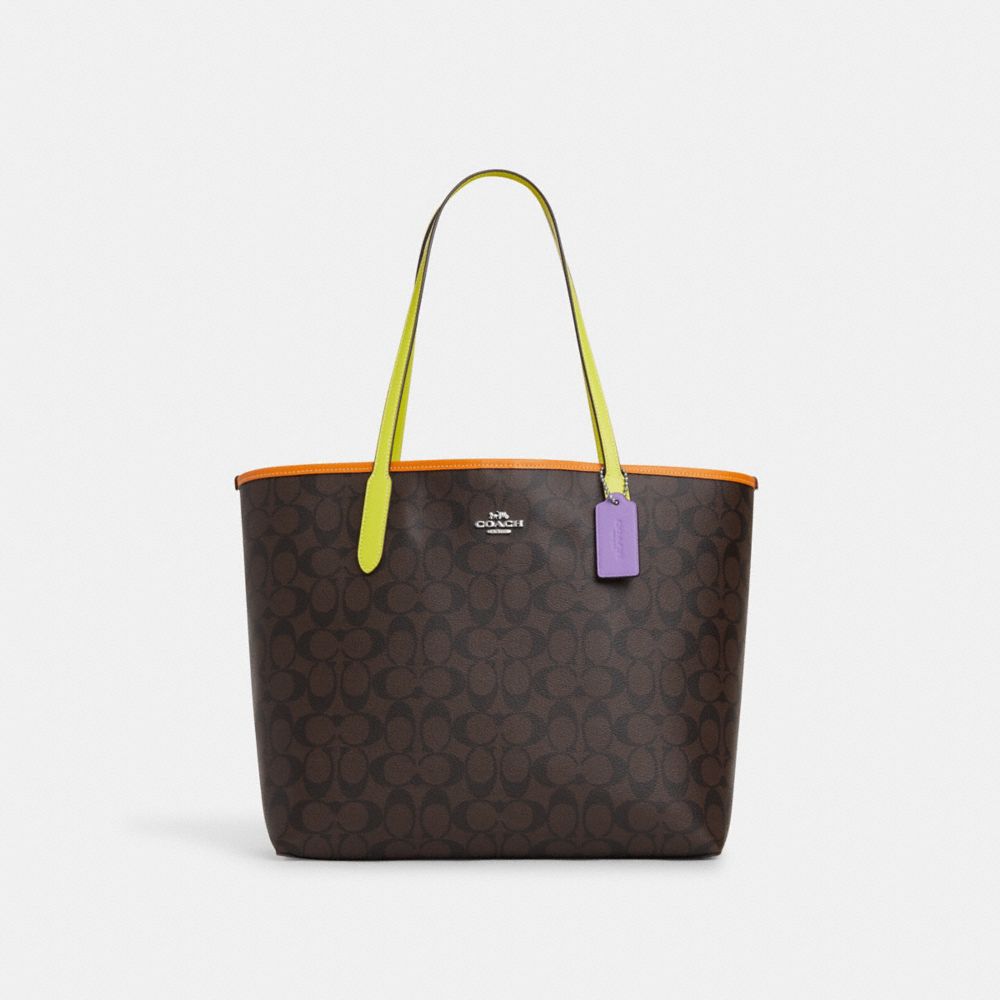 zip top tote in signature canvas