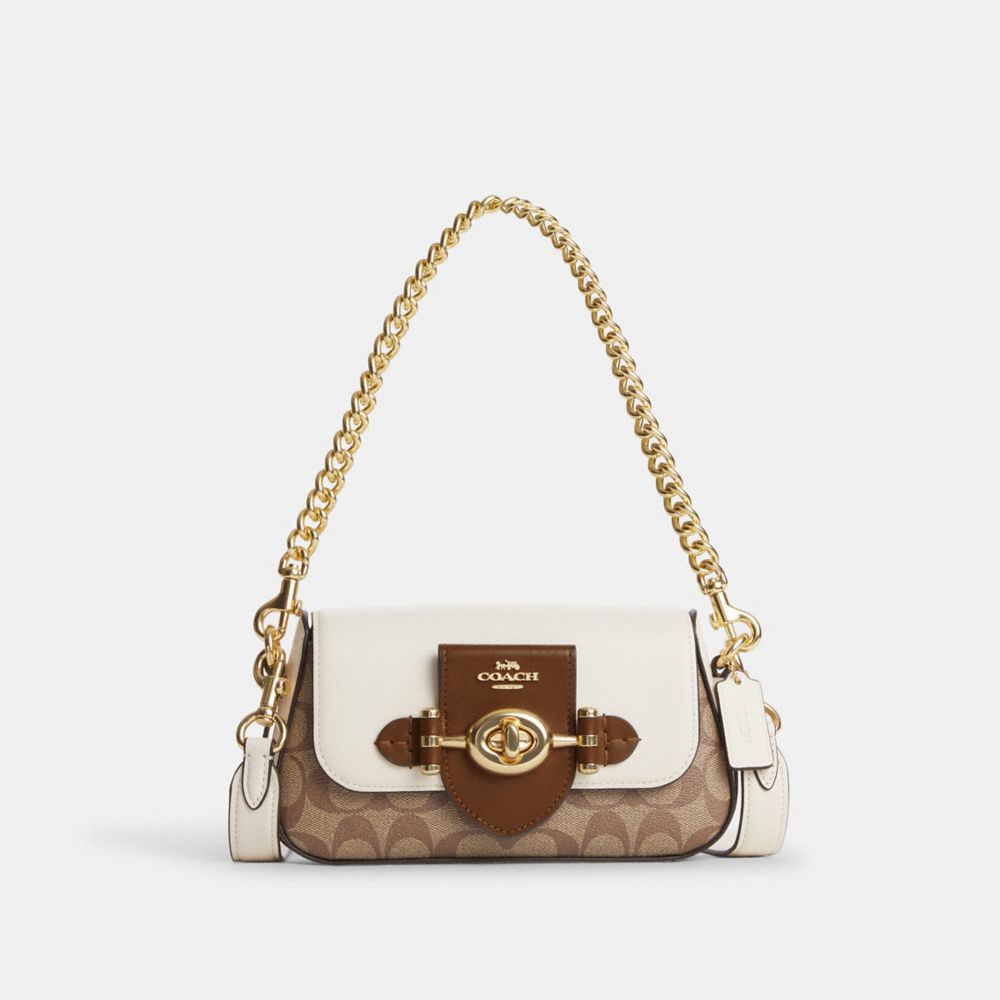 COACH ミニ サドル バッグ チャーム シグネチャー キャンバス - バッグ