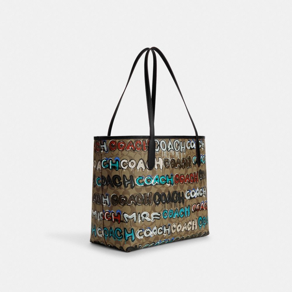 COACH®,COACH X MINT + SERF CITY TOTE IN SIGNATURE CANVAS,Signature Coated Canvas,Silver/Khaki Multi,Angle View