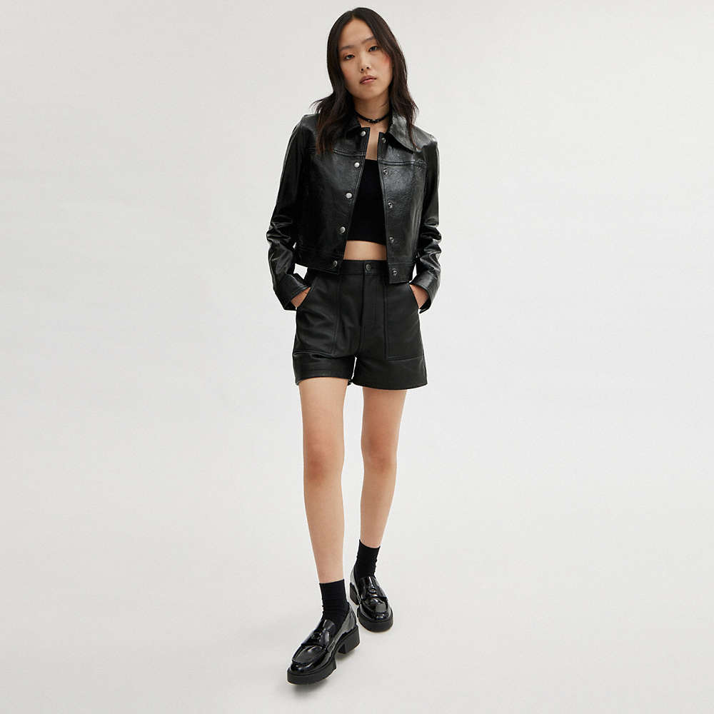 Shop Coach Patent Leather Jacket In Black