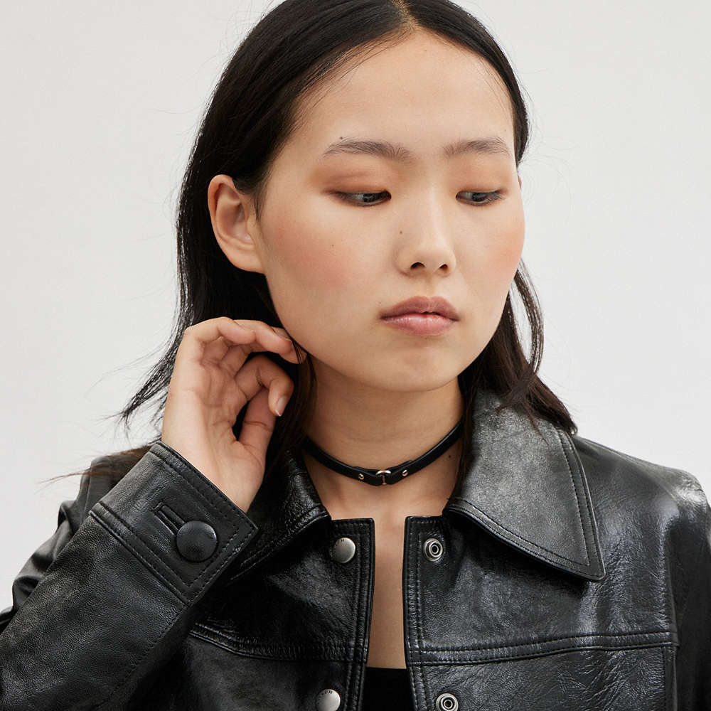 Shop Coach Patent Leather Jacket In Black