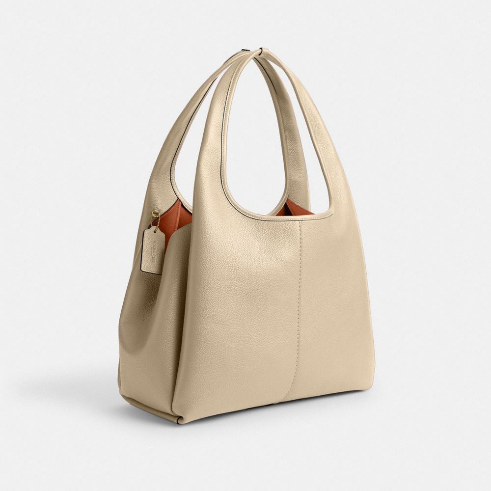 Coach In Brass/ivory