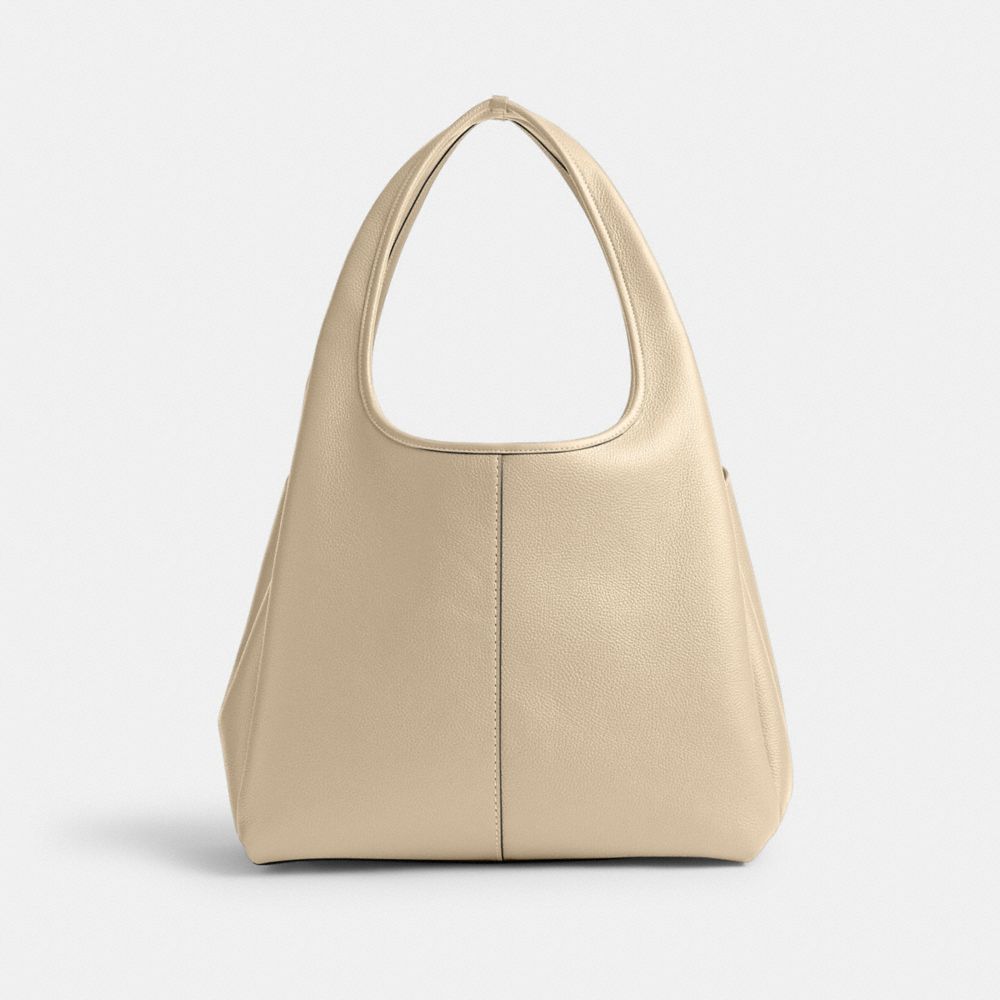 Coach In Brass/ivory