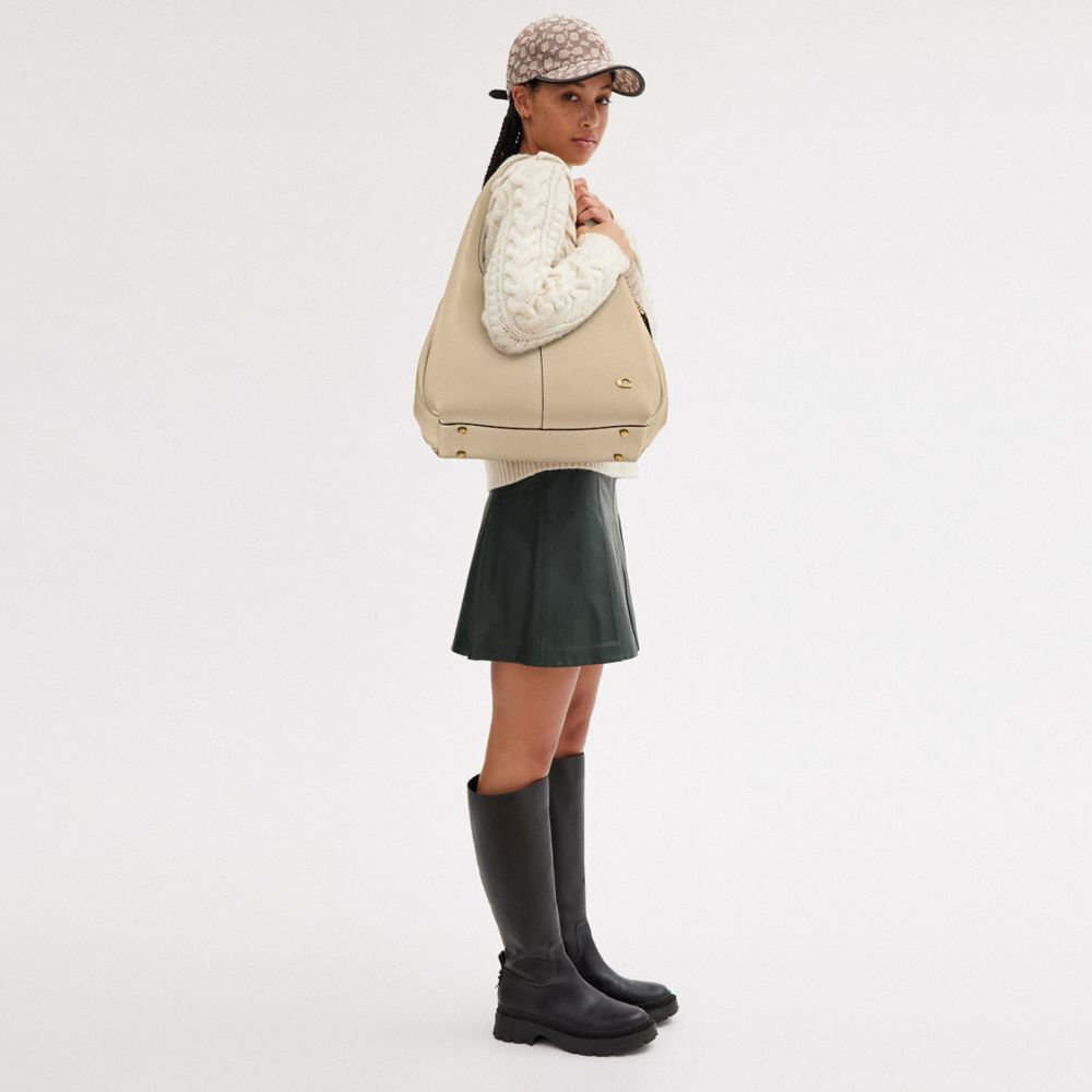 Coach In Brass/ivory