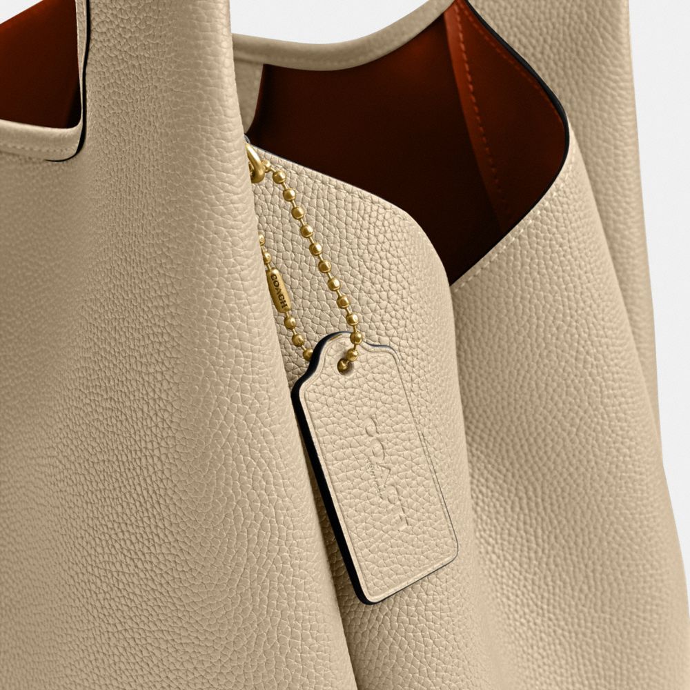 Coach In Brass/ivory