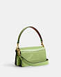COACH®,TABBY SHOULDER BAG 20 IN SIGNATURE LEATHER,Patent Leather,Small,Brass/Green,Angle View